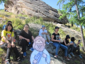 Flat Jesus hanging out with friends on the side of the mountain.